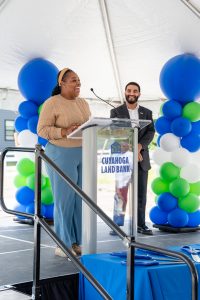 Crystal Bryant, Circle East District's first new homeowner speaks at the Friday ribbon cutting event.